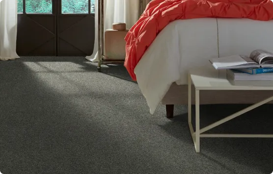 Bedroom with gray carpet